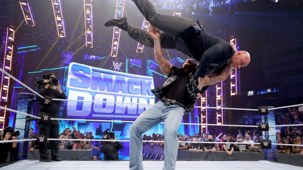 Brock Lesnar giving Adam Pearce an F5 on WWE Smackdown
