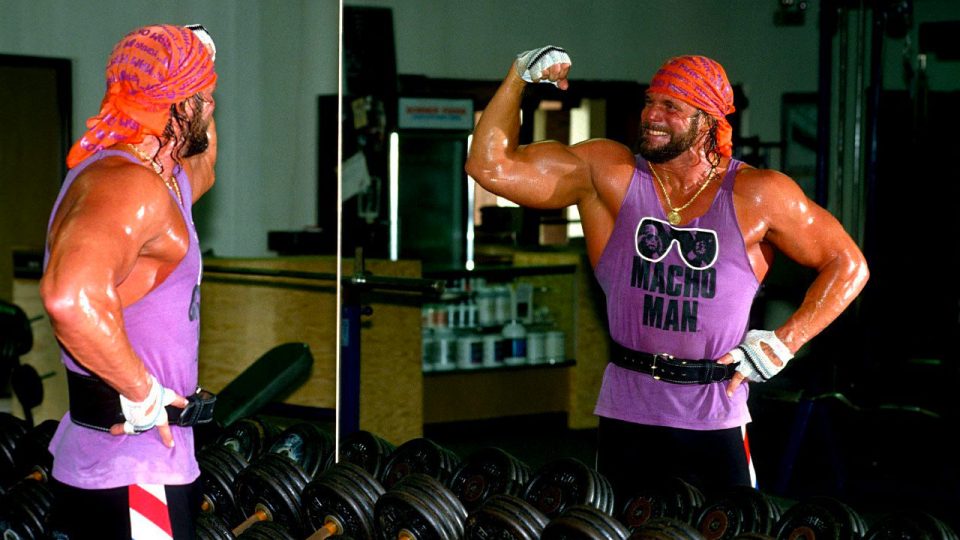 "Macho Man" Randy Savage poses in front of mirror