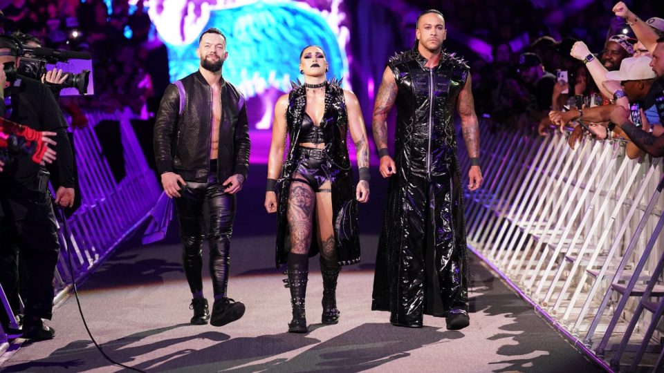 The Judgement Day Finn Balor Damian Priest Rhea Ripley make their entrance at WWE SummerSlam 2022