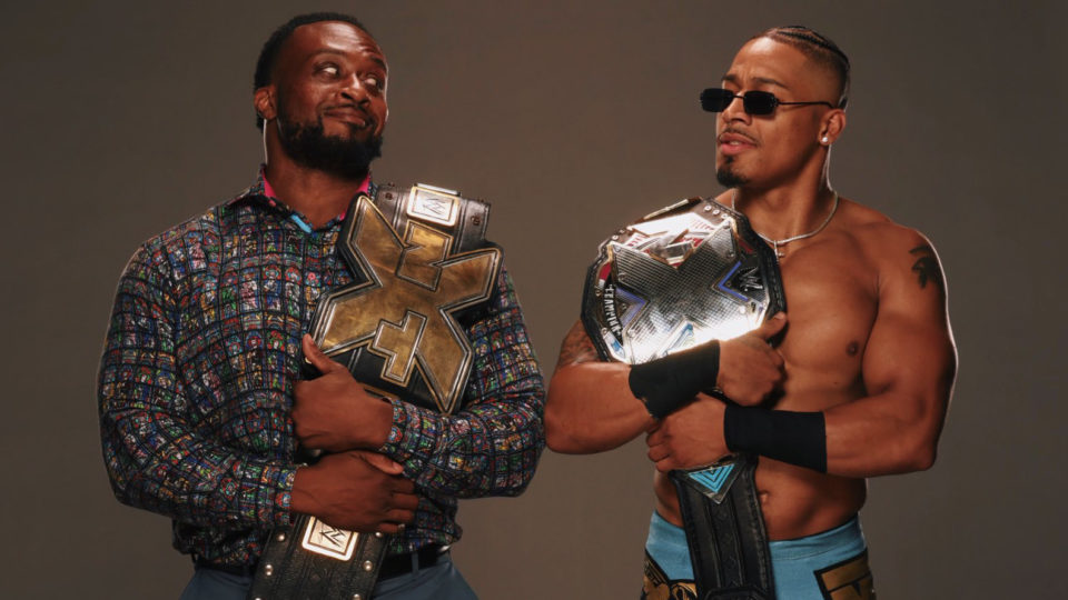 Big E and Carmelo Hayes holding their respective NXT Championships