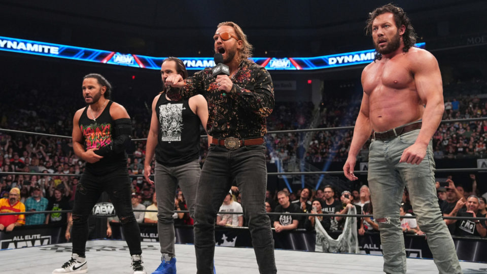 The Young Bucks, Hangman Adam Page and Kenny Omega cutting a promo in AEW