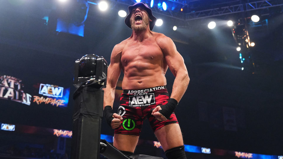Jake Hager posing during an entrance in AEW