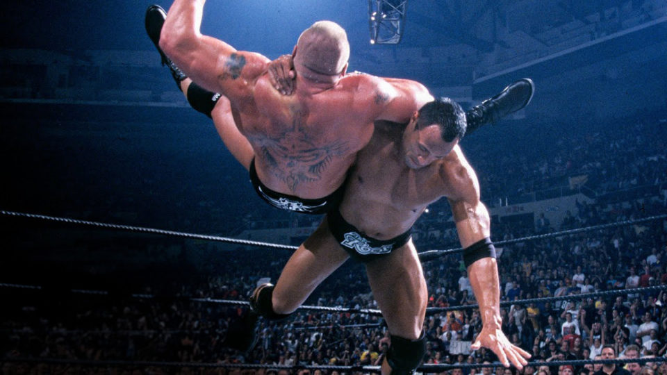 The Rock hitting a Rock Bottom on Brock Lesnar at WWE SummerSlam 2002