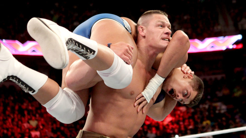 John Cena hitting an Attitude Adjustment to Cody Rhodes