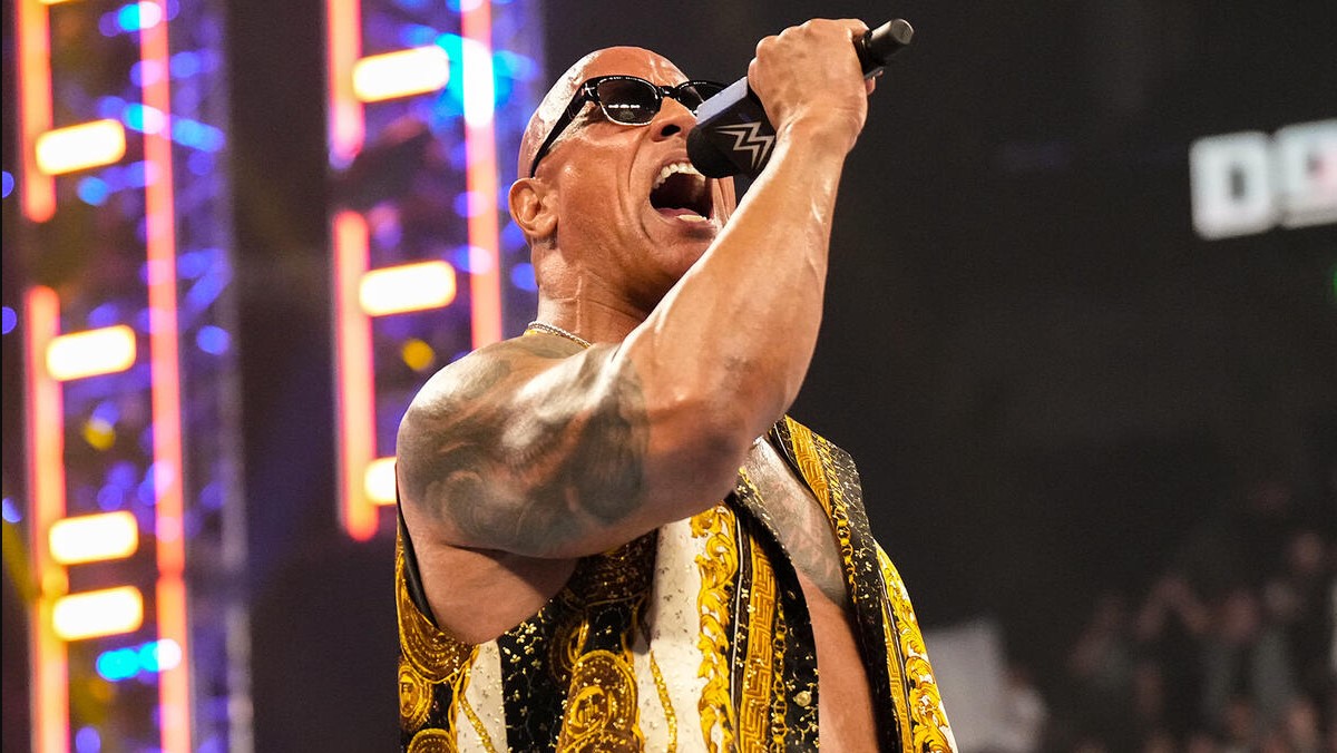 The Rock lays down a challenge for WrestleMania 40 - his first match in  eight years - TEAMING with Roman Reigns… but WWE fans notice his strange  Bloodline signal