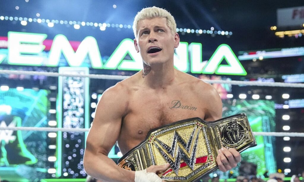 Cody Rhodes with Undisputed WWE Universal Championship